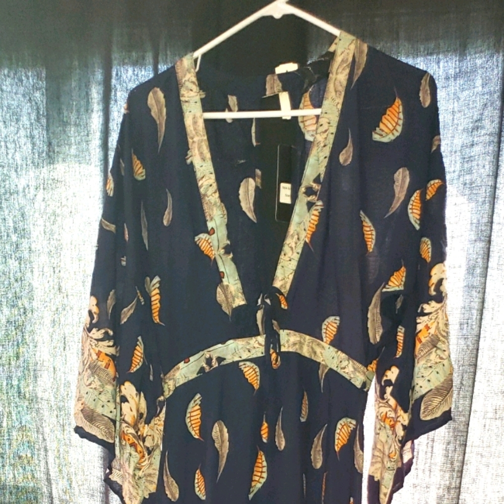 Navy dress with feathers